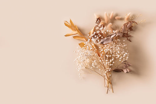 Dried flower arrangement (display case placeholder)